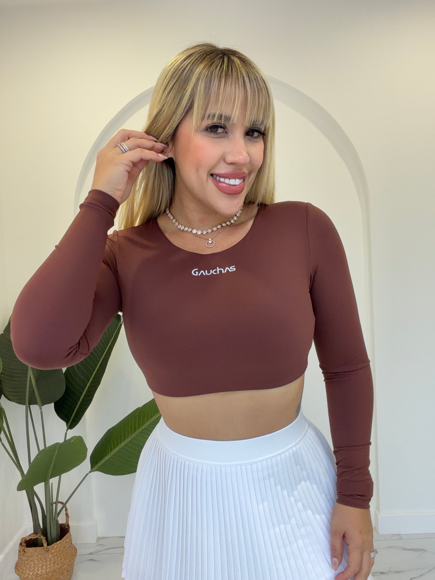 Manga larga crop sport top