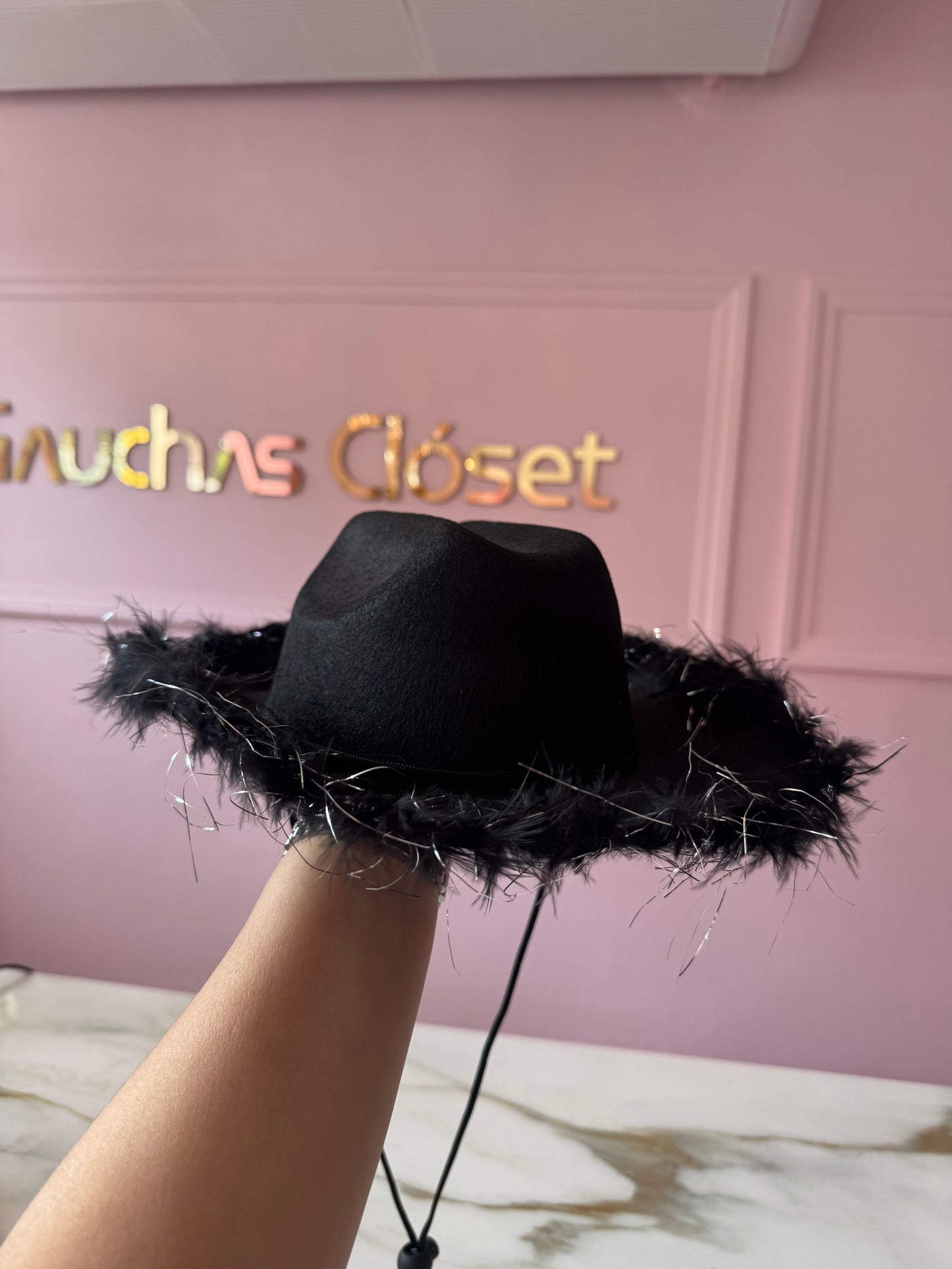 Gorro plumas vaquera