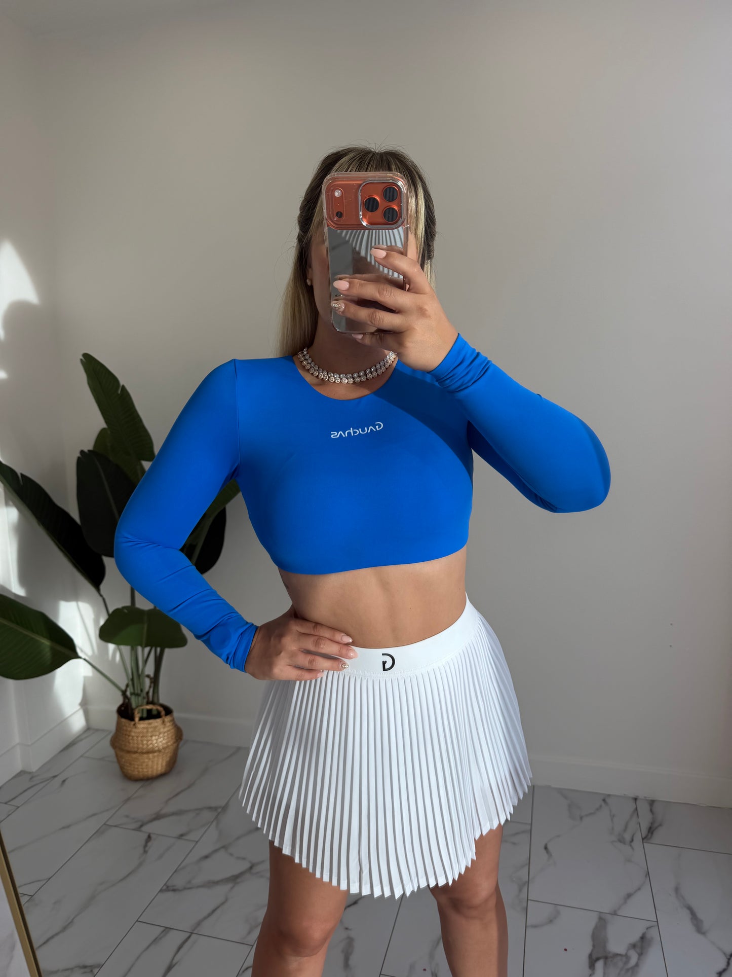 Manga larga crop sport top