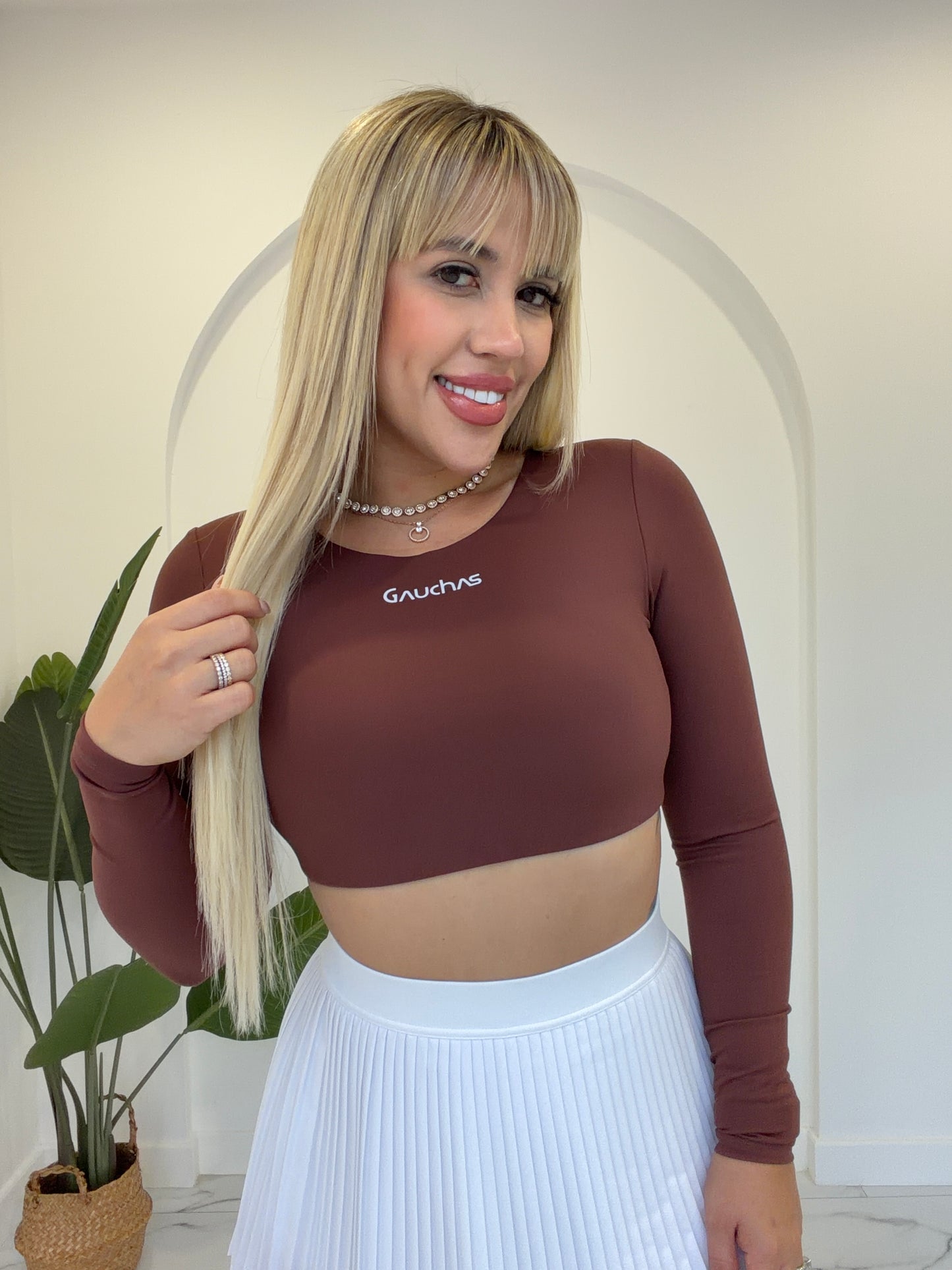Manga larga crop sport top