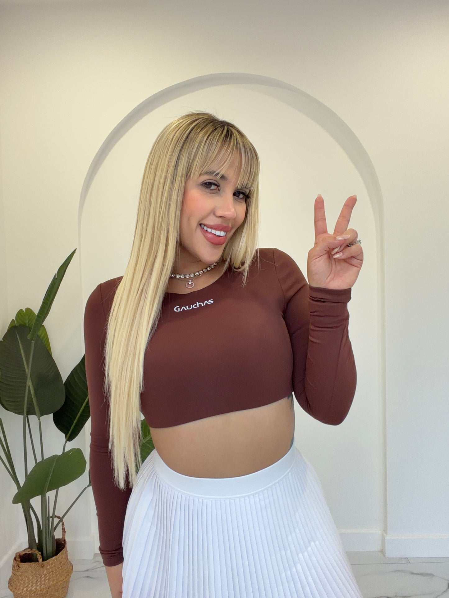 Manga larga crop sport top