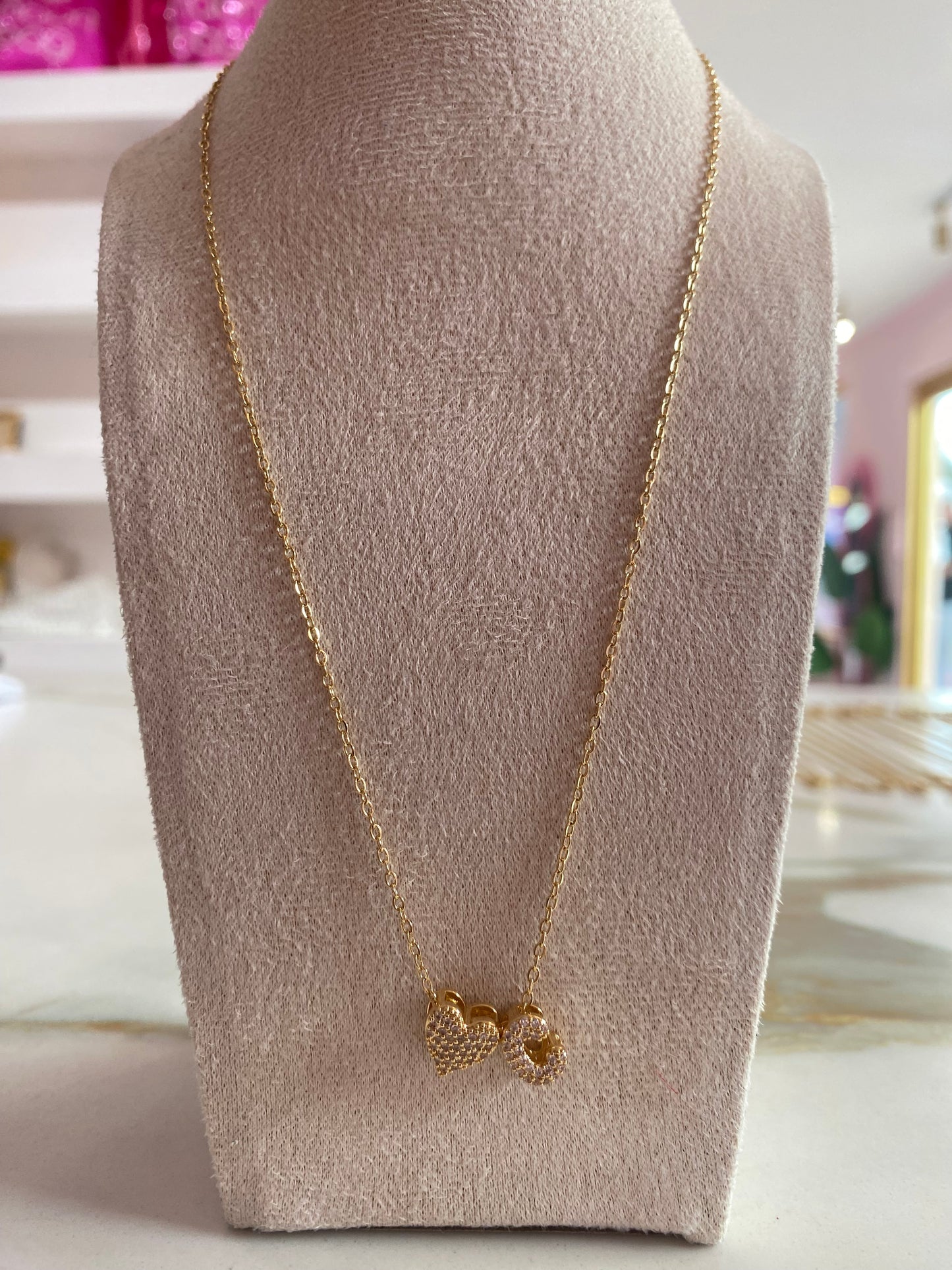 Letra collar con corazon