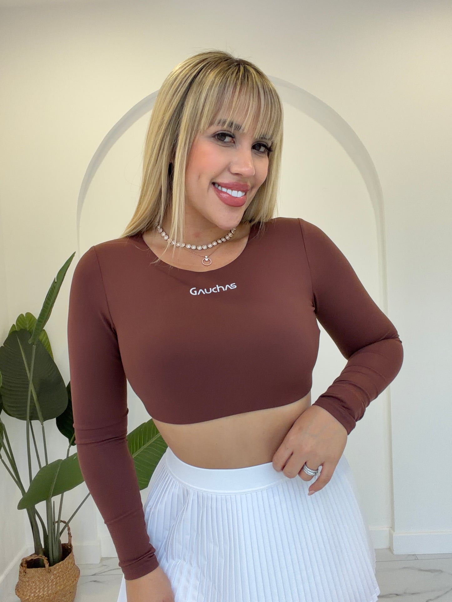 Manga larga crop sport top