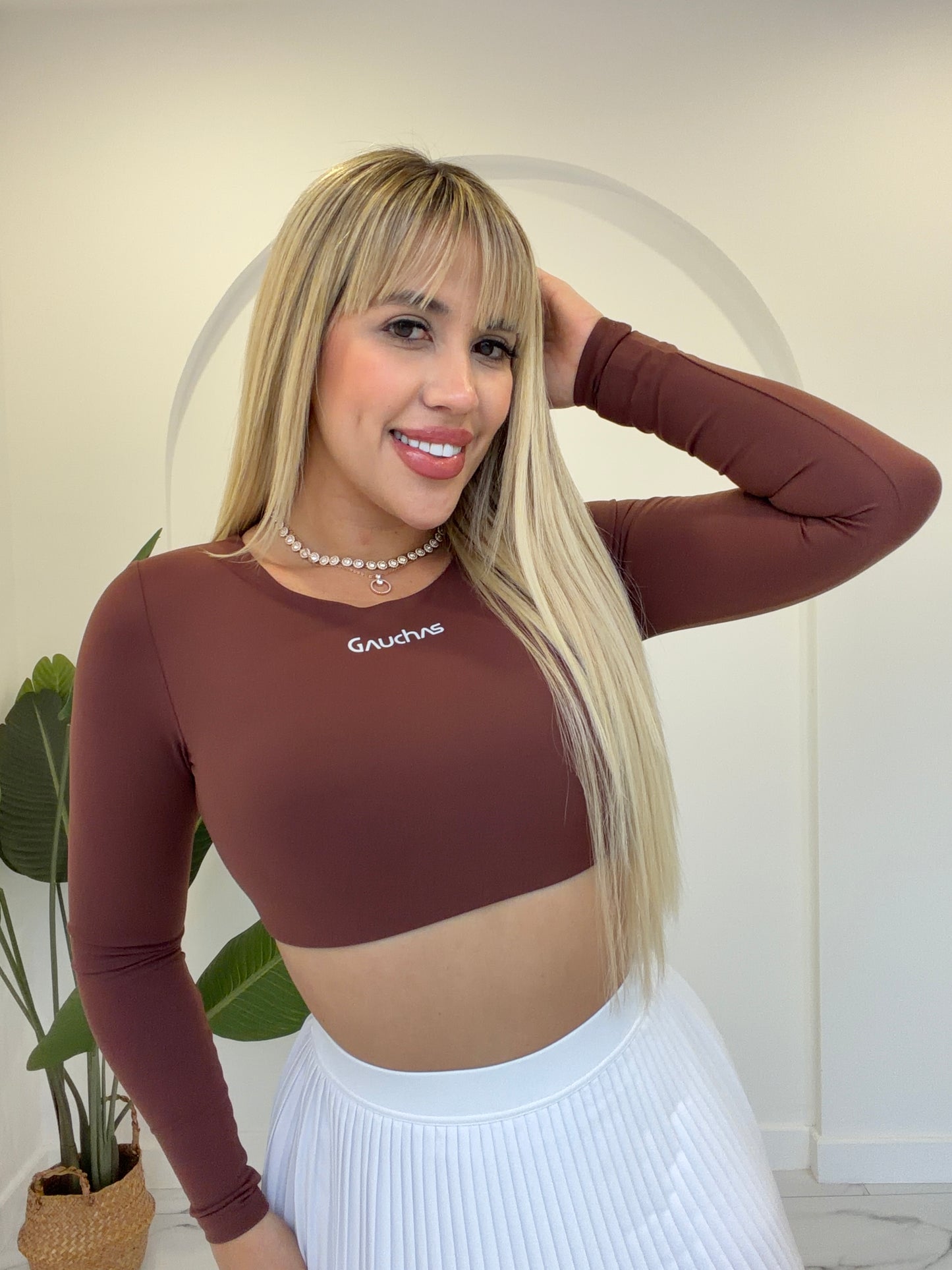 Manga larga crop sport top