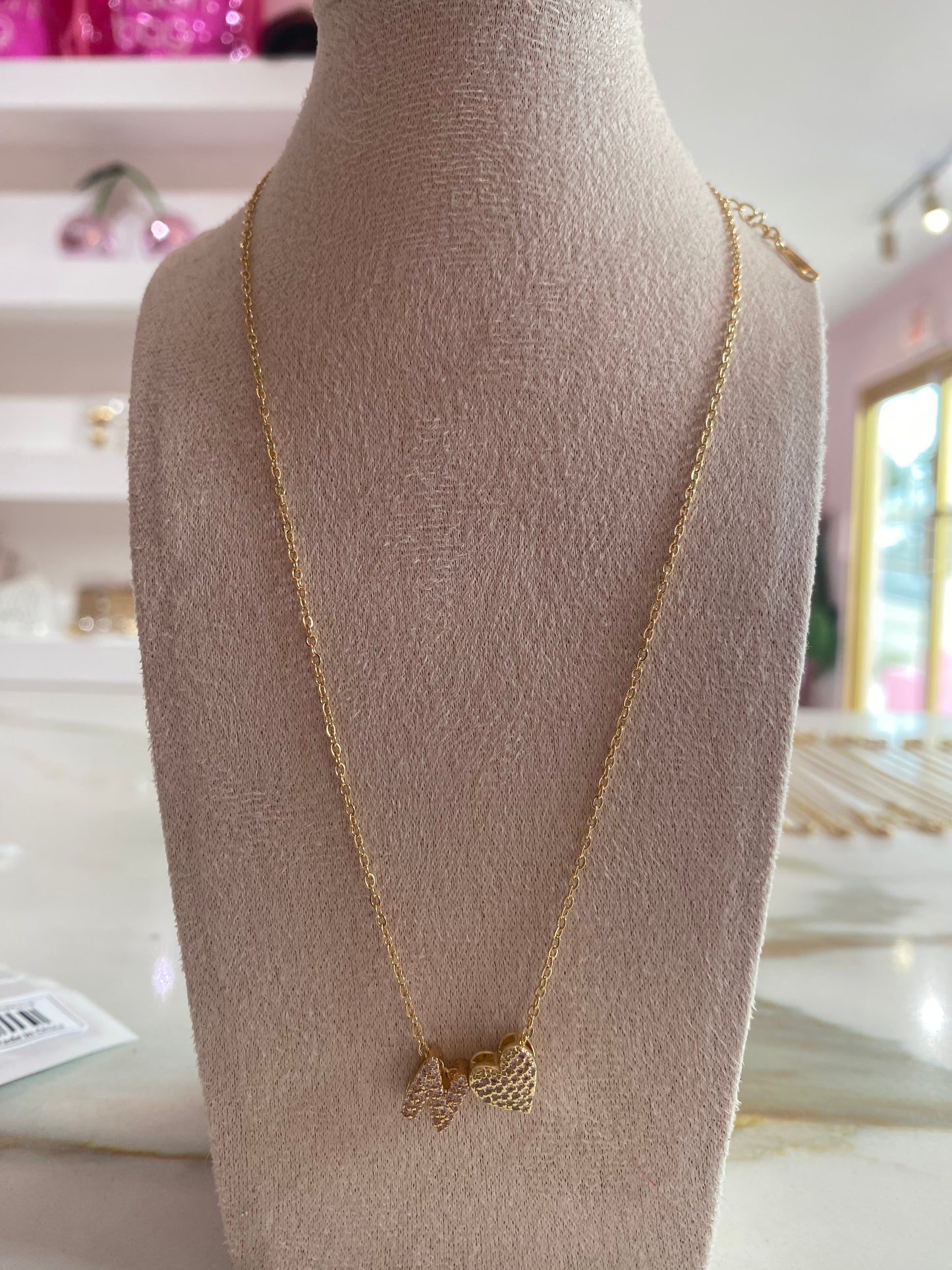 Letra collar con corazon