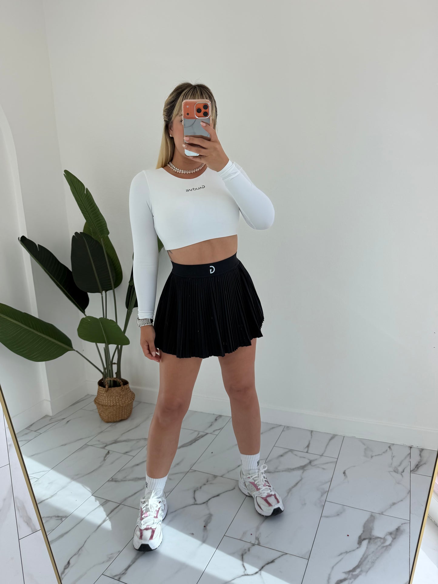 Manga larga crop sport top