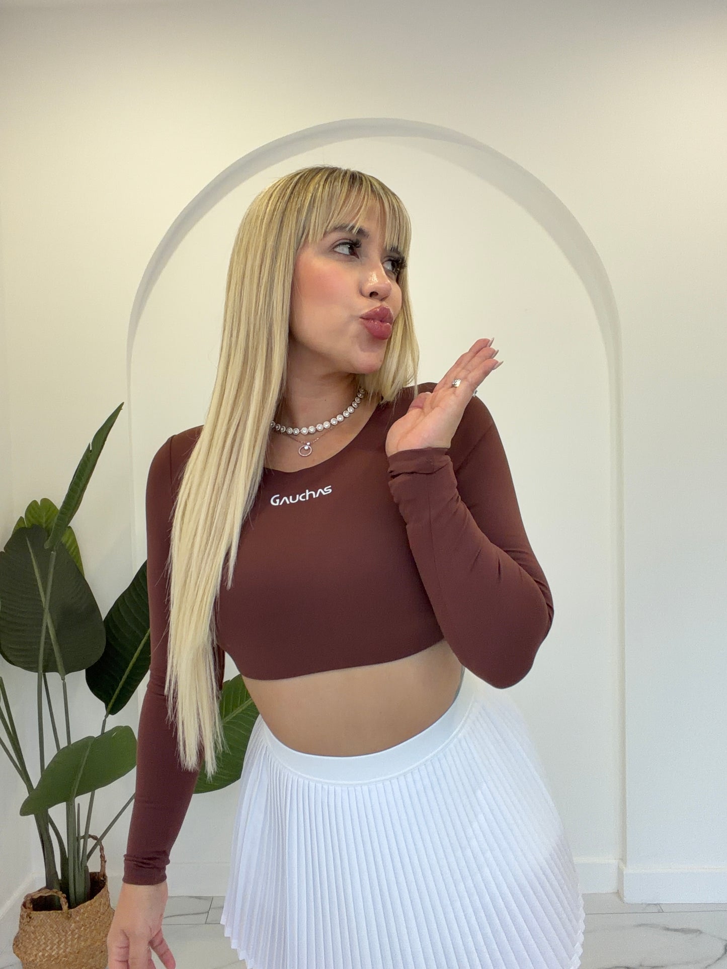 Manga larga crop sport top